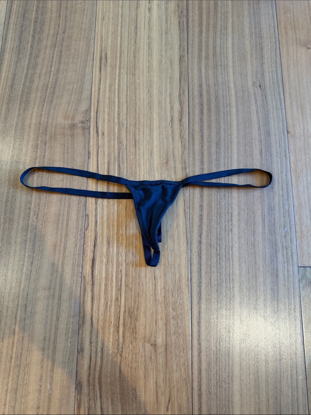 SKIMS Black Minimal Micro Thong Swim Bottom